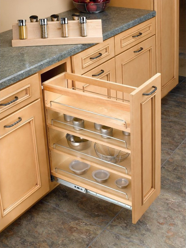 Narrow pull-out spice drawer with shelves that are not accessible because they are too close together